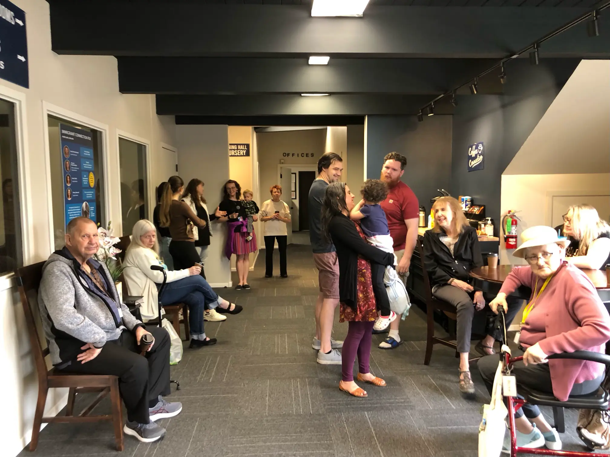 Community gathering in the church lobby