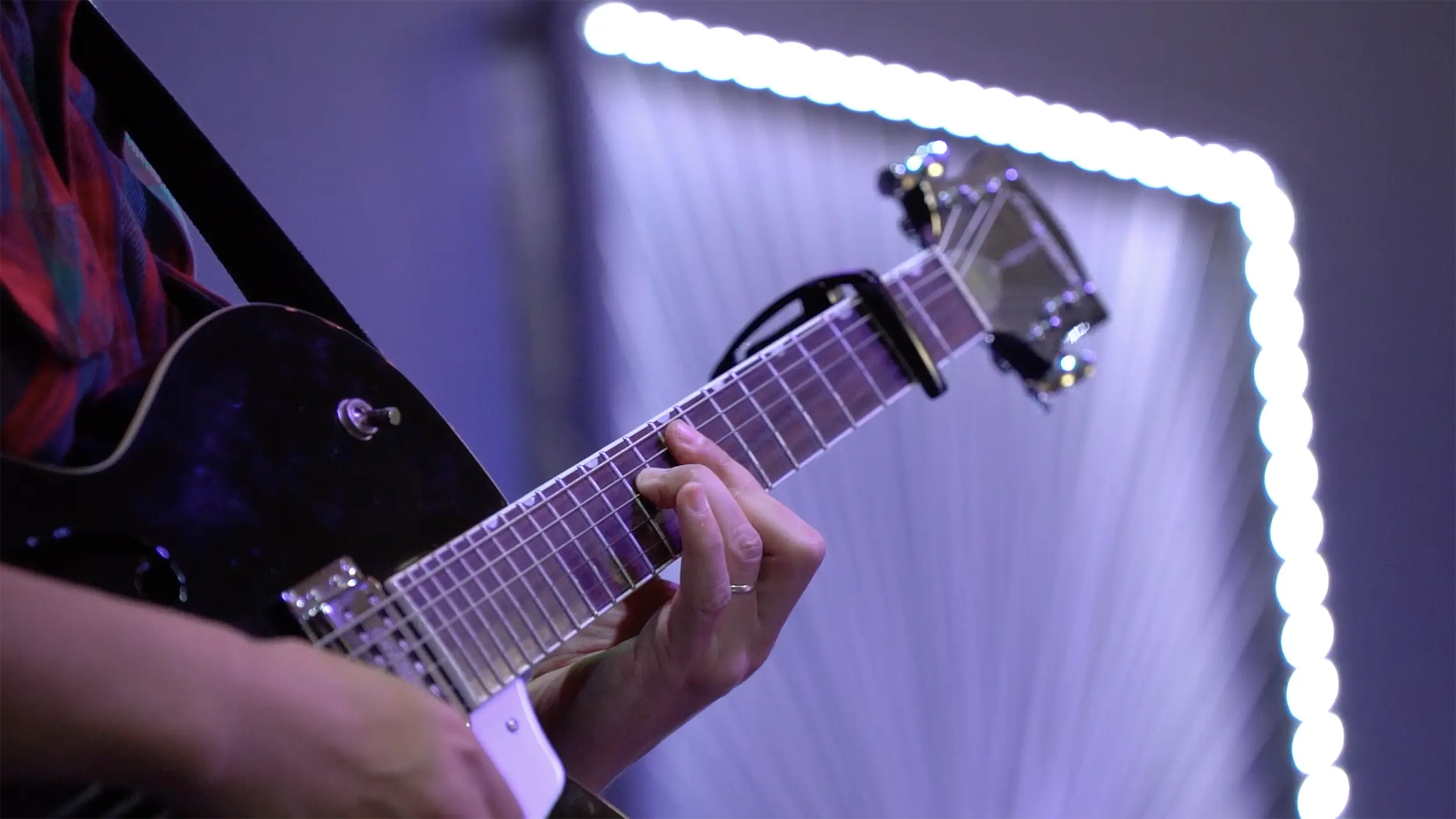 Johan leading worship on guitar